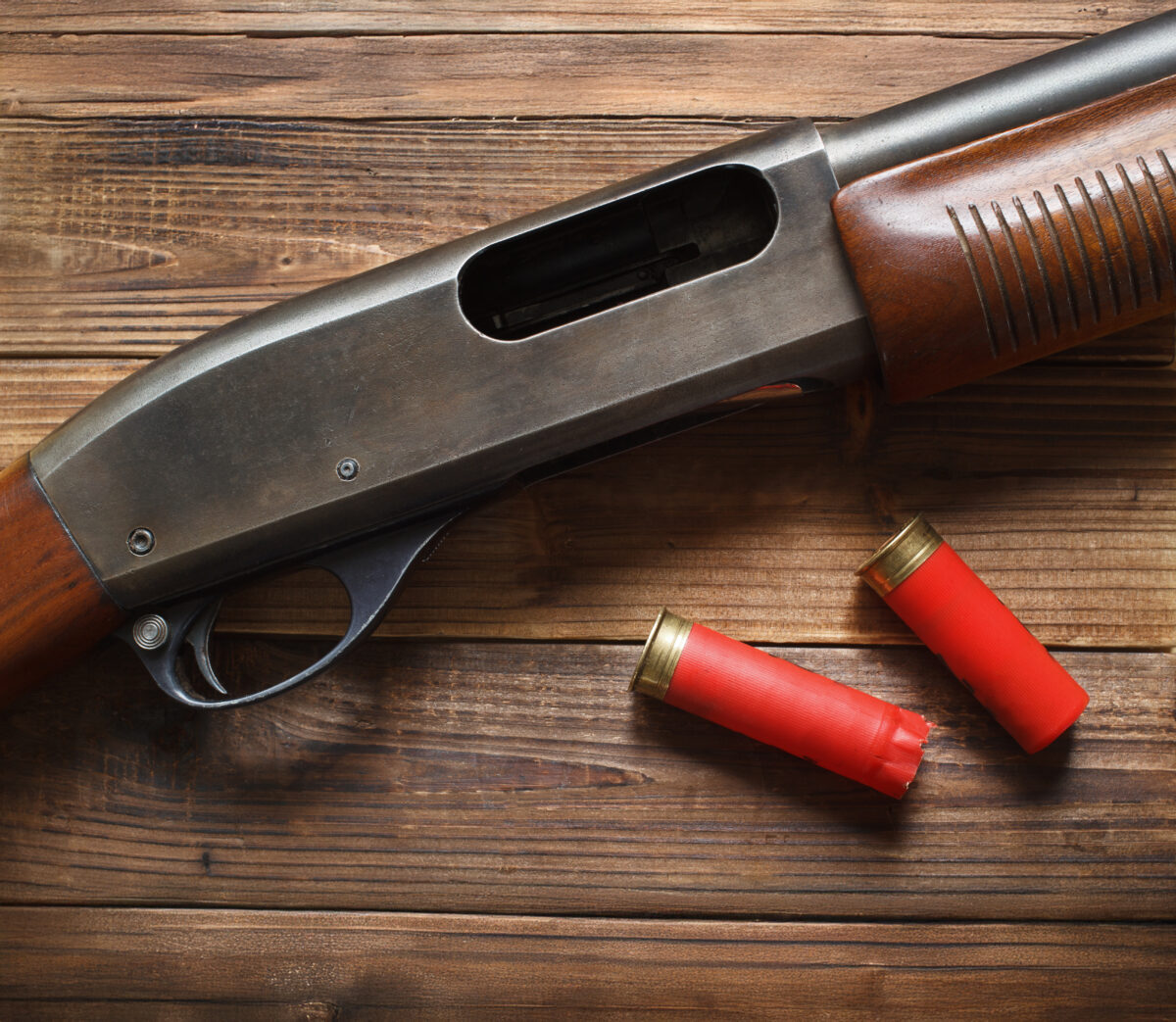 remington 870 pump shotgun on table