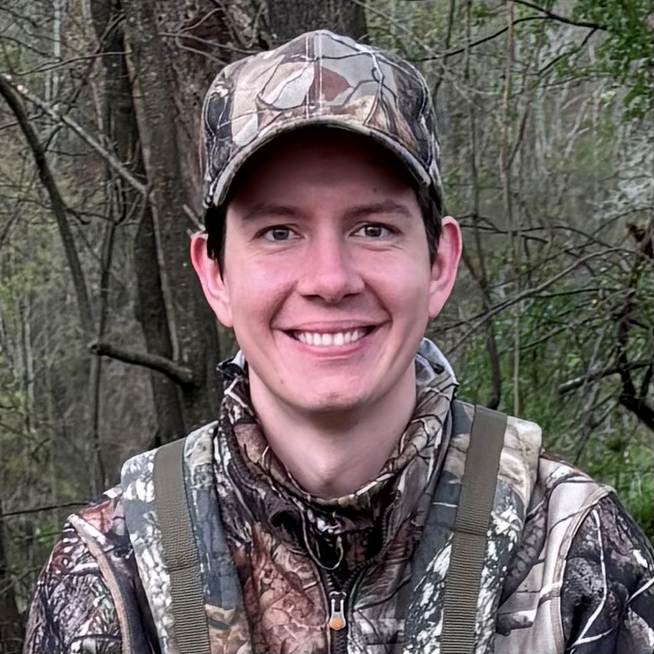 A hunter in Realtree camouflage.